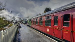 Haulwen and its train at Bronwydd Arms on the Gwili Railway