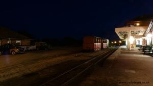 Talyllyn Open Carriages stand in the middle road during Talyllyn Steam at Night event