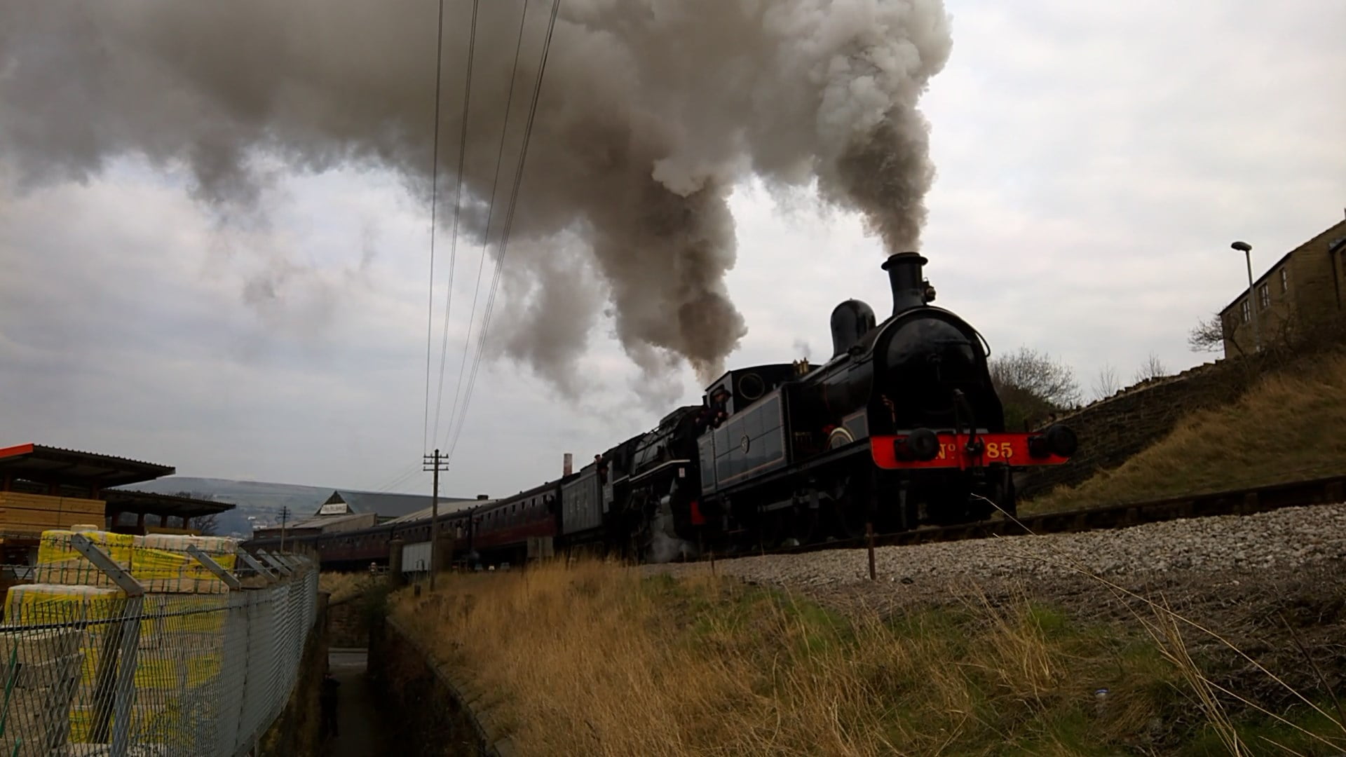 No. 85 and S160 'Big Jim' depart Keighley