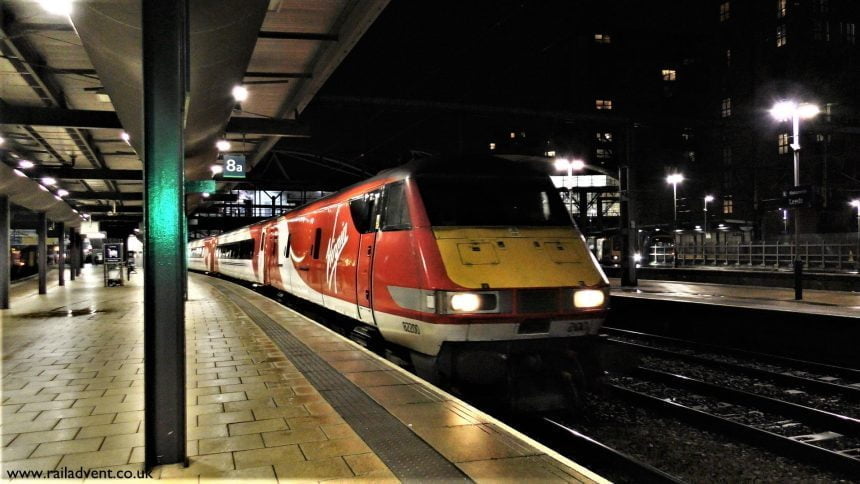 A Virgin Trains East Coast Class 91 / 225 departs Leeds with a service to Kings Cross