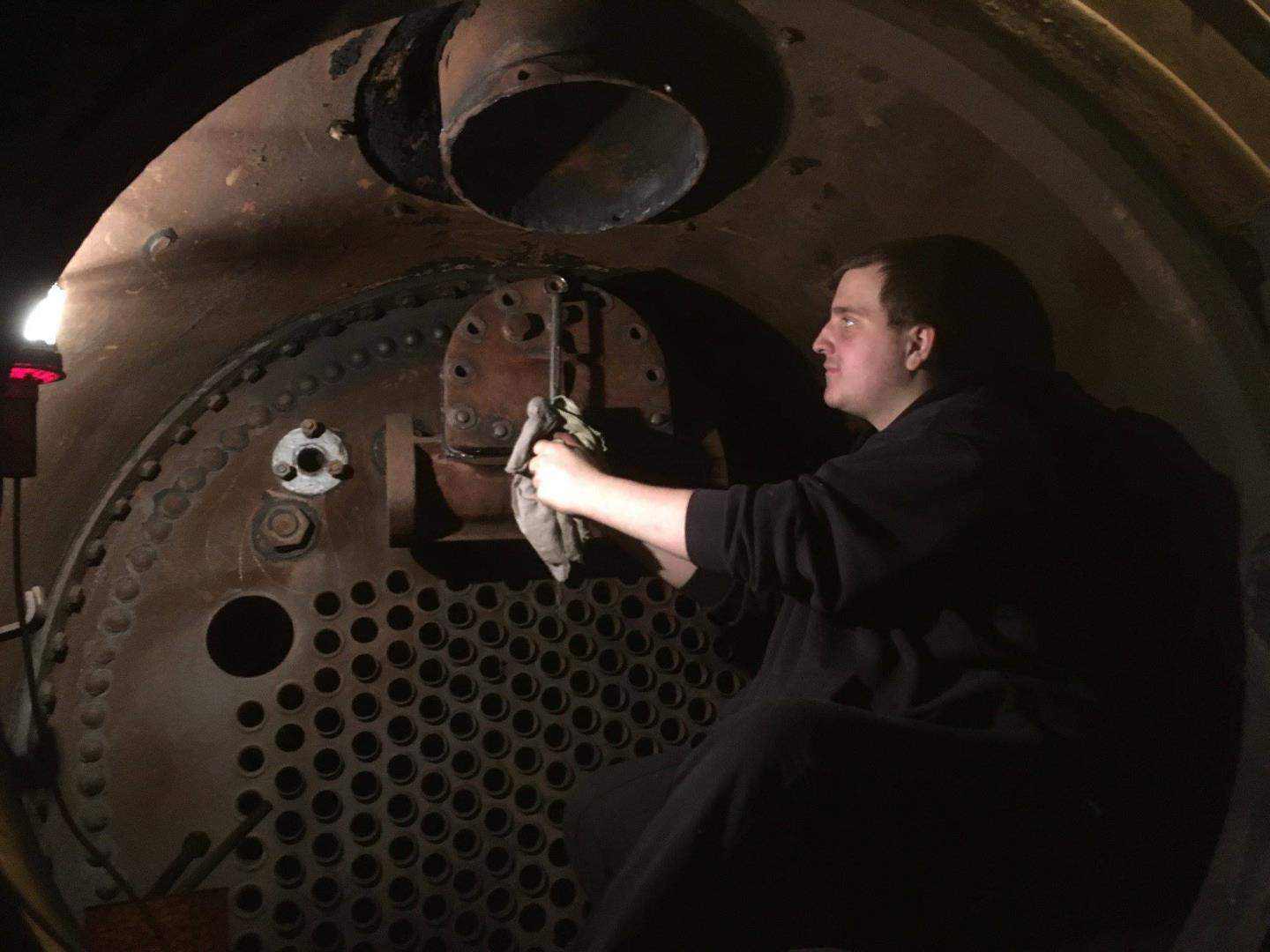 Jamie Removes the last Bolt holding the Regulator Cover in place // Credit 
GWR Pannier Tank 3650 FB Page