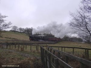 Oliver Cromwell passes 'Top Field' with a freight train towards Oxenhope during a 30742 charter