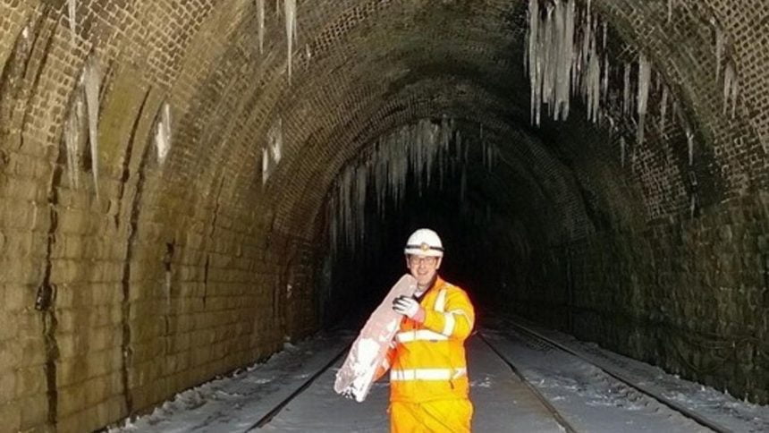 15ft icicles block railway line in manchester