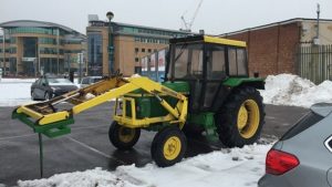Train driver uses tractor to get to work during snow