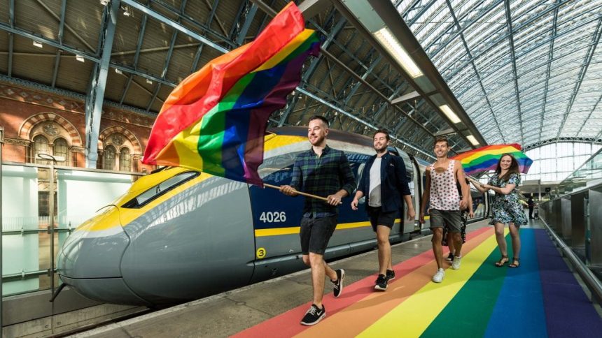 Passengers travelling by Eurostar to London to celebrate Pride 2018 are welcomed by a rainbow carpet on the platforms at St Pancras International.
