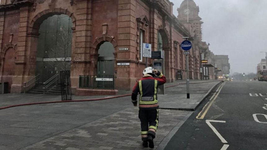 A firefighter close to Nottingham railway station which has been evacuated and services passing through cancelled after a fire broke out. PRESS ASSOCIATION Photo. Picture date: Friday January 12, 2018. Nottinghamshire Fire and Rescue service say that eight appliances are in attendance at a major incident. See PA story FIRE Station. Photo credit should read: Matthew Vincent/PA Wire