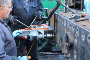 Drilling Bolts out of Tender's Buffer Beam // Credit The Watercress Line