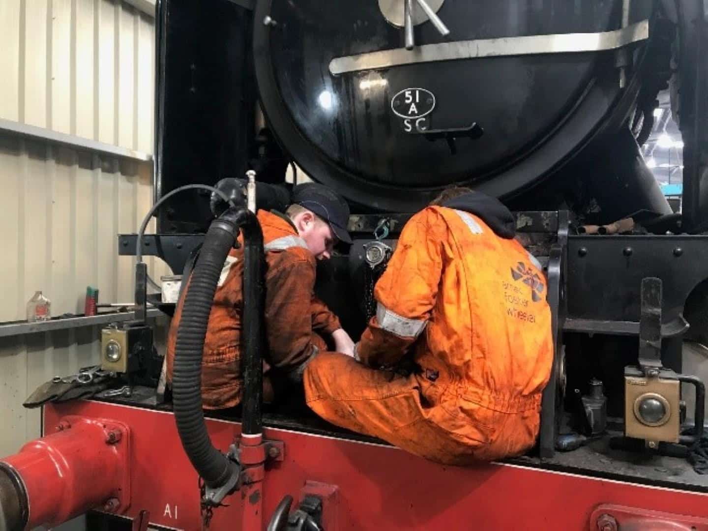 Members of the Team Working on 60163 // Credit A1SLT