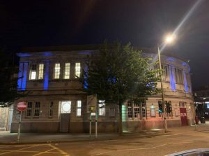Swansea station lit up blue in support NHS workers