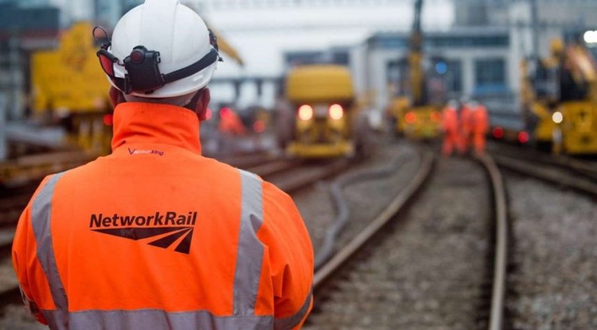 Network Rail Worker On Track