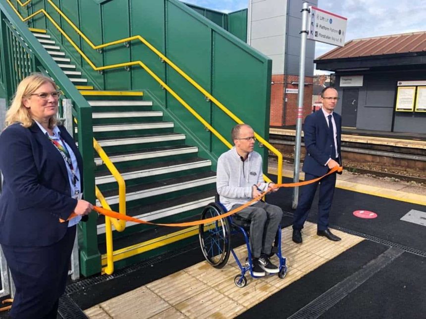 Alison Thompson, Simon Green and James Price at the opening of Cadoxton's new lifts
