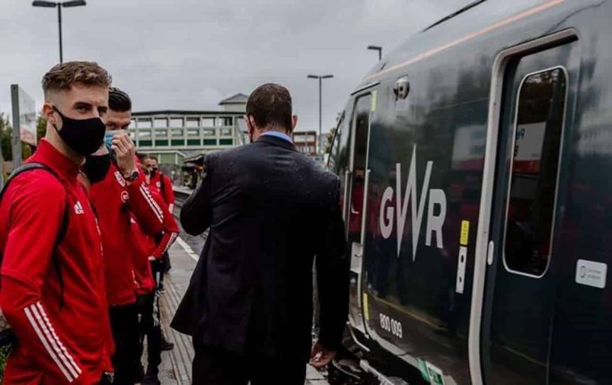 Joe Rodon, Kieffer Moore and other members of the Wales team about to board