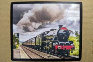 This Mouse mat featuring LMS Jubilee 45562 Alberta heading through Gargrave