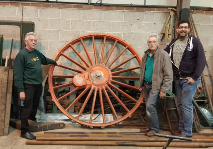 CCT directors Richard Croucher (left), David Bradshaw and Gary Boyd-Hope with the wheel pattern for No. 3840’s coupled wheels. The pattern had previously been used to cast the six drivers of No. 2999 Lady of Legend.