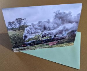 Greetings card with steam locomotive 6990 Witherslack Hall and 6023 King Edward II on the North Yorkshire Moors Railway