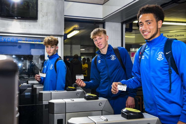 Luton Academy FC at Luton railway station with their Thameslink travel cards, from left Archie Heron, Edward McJannet and Millar Matthews-Lewis.