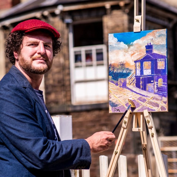 Paul Mirfin with his easel and painting