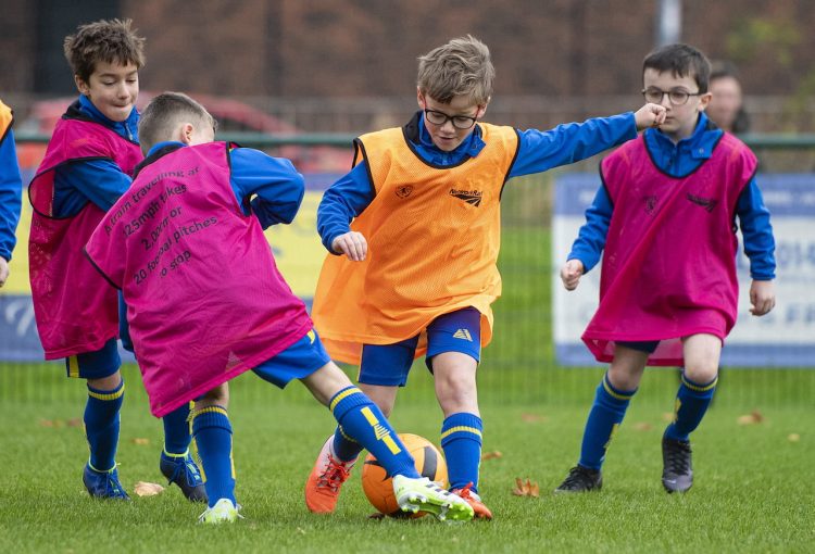 Young footballers taking part in the football camps