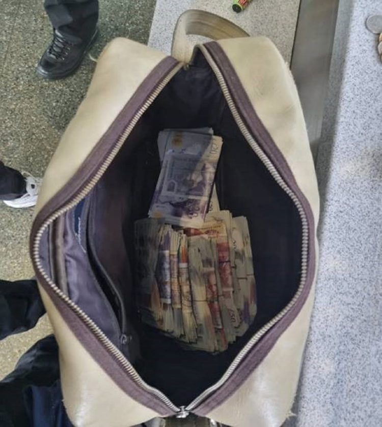 Bag Showing seized money