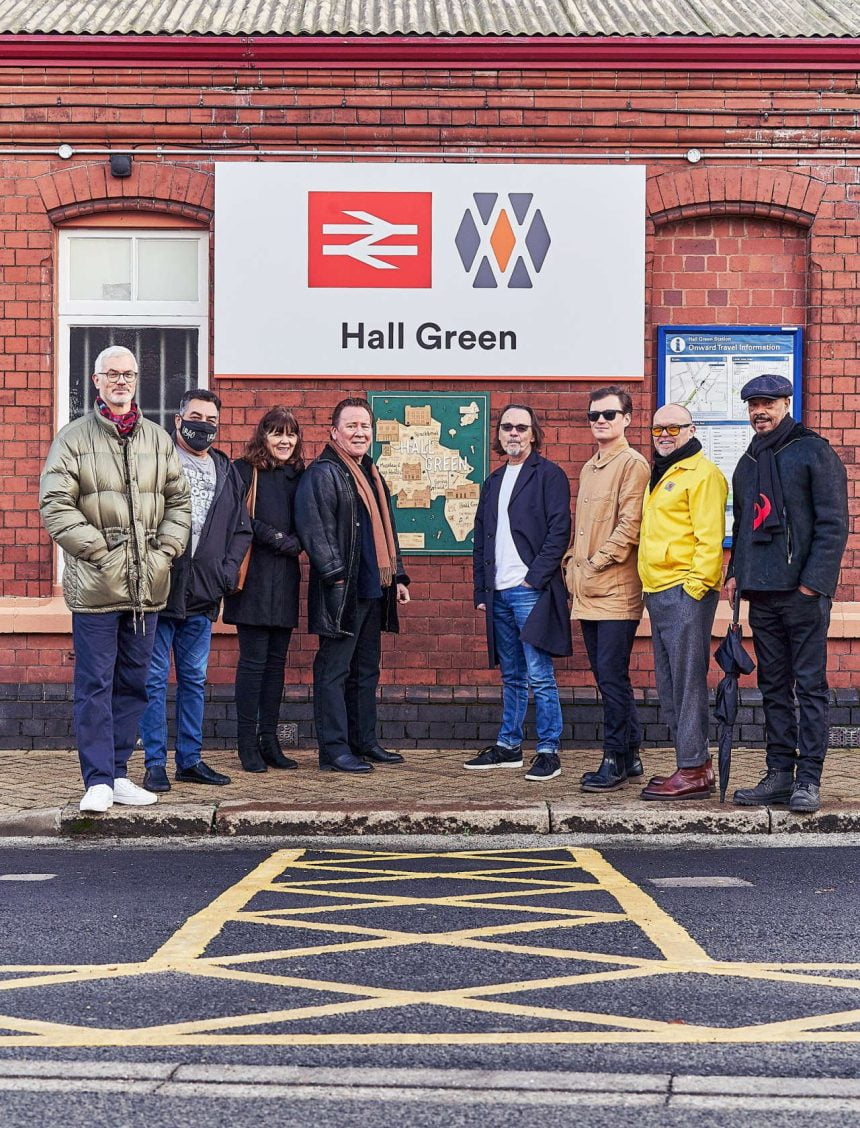 Members of UB40 with invited guests at Hall Green station in Birmingham
