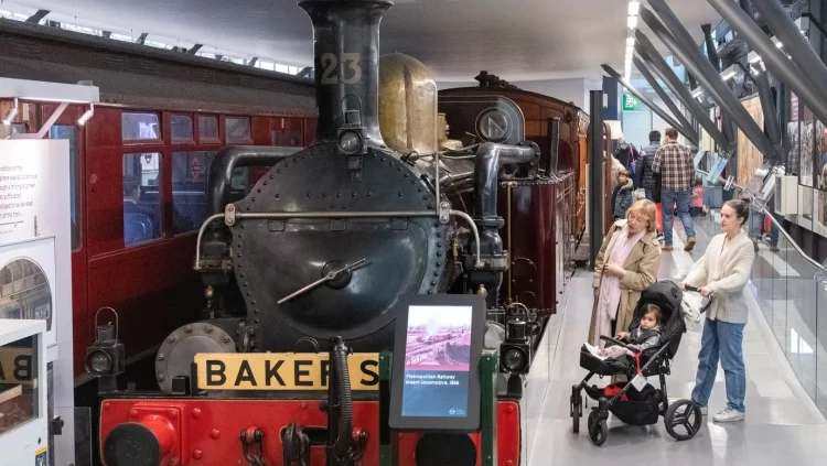 A family enjoying a day out at the London Transport Museum