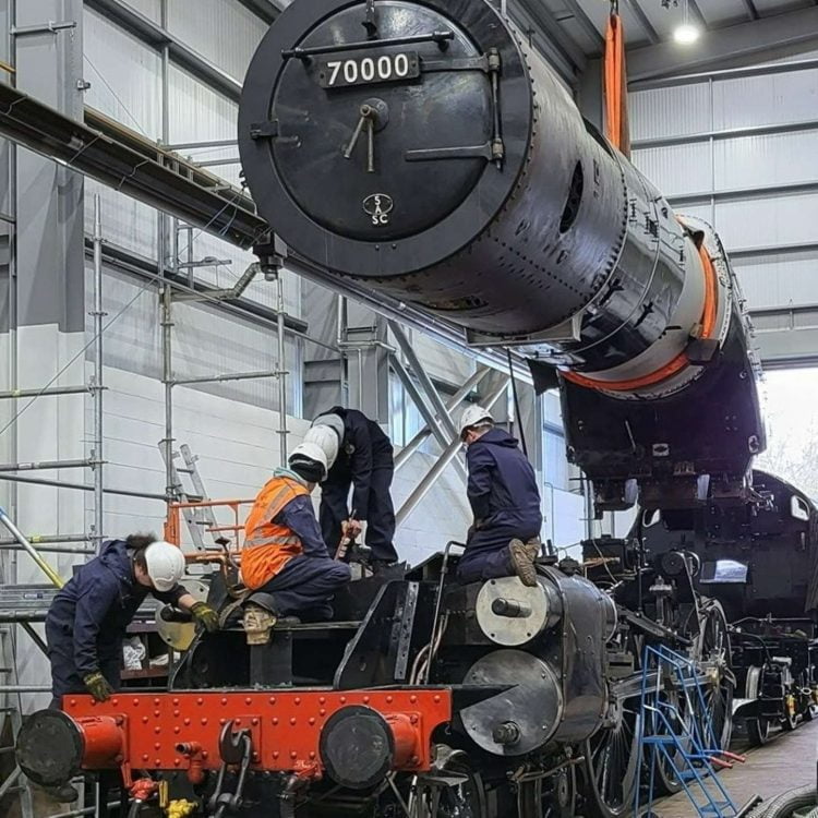 Lowering 70000's Boiler into the Frame // Credit Locomotive Services Group