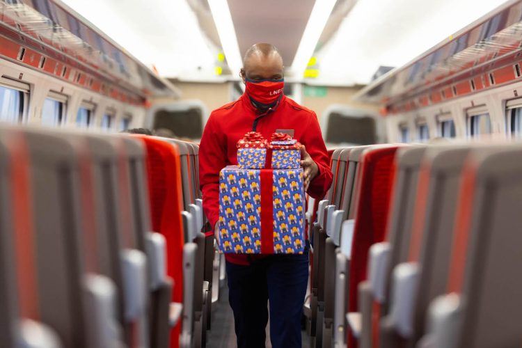 LNER staff member returns a well wrapped gift
