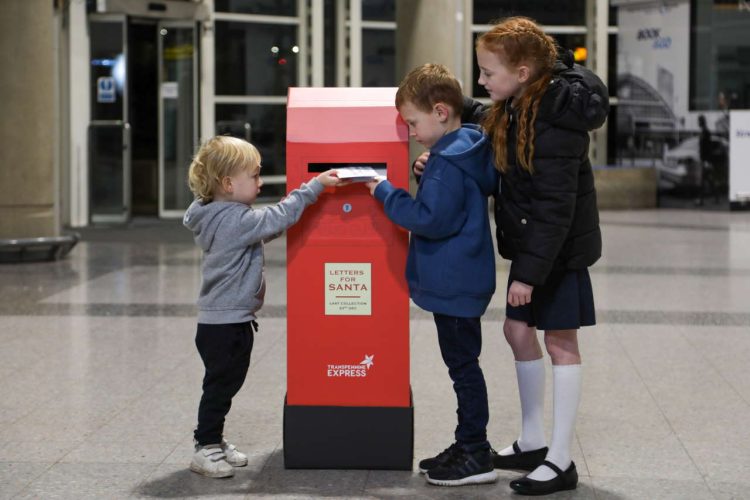 Bruno, 2, Enzo, 5, Nella, 8, deliver letters to Santa in TPE's Post-box