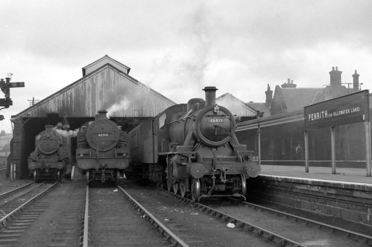 A busy day at Penrith circa 1951 with a Darlington via Stainmore train (right) and a service to Keswick (left). Locomotive 42313 (centre) is awaiting its next working.
