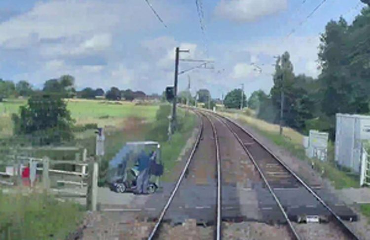 Forward facing CCTV image showing position of the mobility scooter and user as the train approached