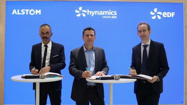 Stéphane Kaba (Alstom), Frédéric Dejean (Hynamics) and Yves Schlumberger (EDF) sign the partnership agreement on hydrogen trains