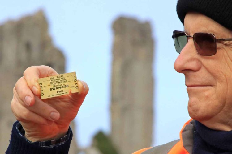 Swanage volunteer Malcolm Munro with his British Rail ticket from the last service