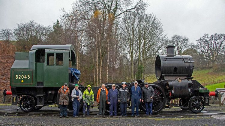 Members of the 82045 Steam Locomotive Trust team with their 2-6-2 loco in the yard. Photo: John Titlow.
