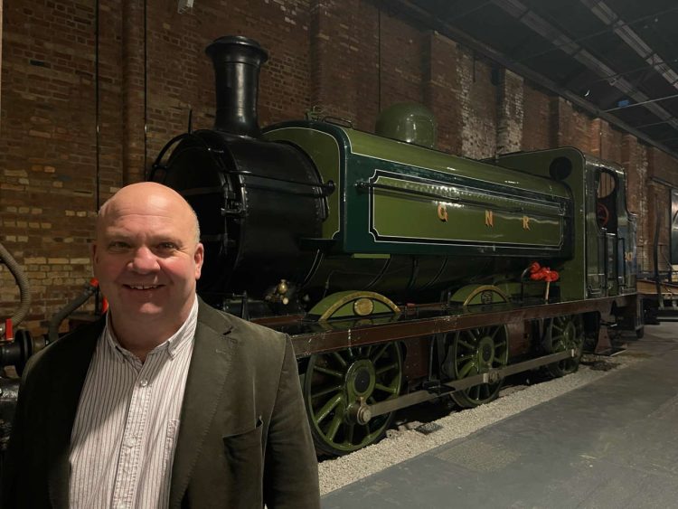 Chris Price, with No. 1247 the locomotive