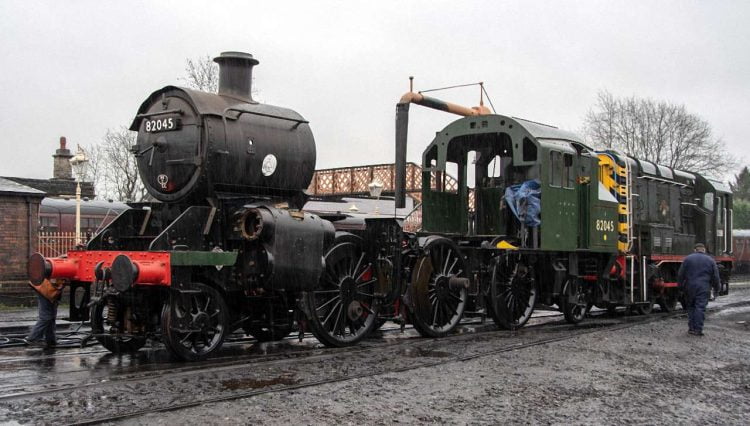In lashing rain 82045 as a 2-6-2 is hauled by D3586 into the daylight for the first time. Photo: John Titlow.