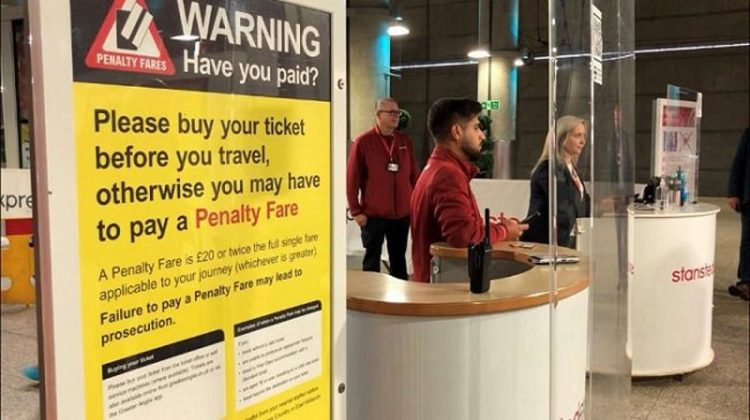 Greater Anglia staff ready to check tickets at Stansted Airport