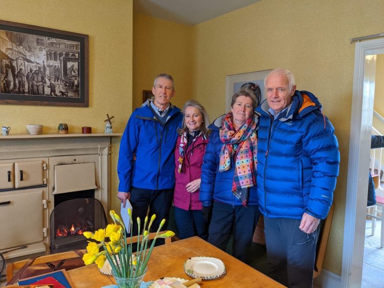 The Cornish family inside the recreation of Norman Cornish's home