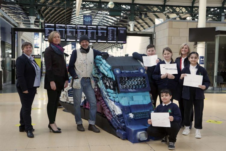 Colleagues of TransPennine Express artist Andy Pea and Year 5 children from Adelaide Primary School at the unveiling of the sculpture (002)