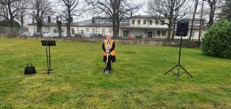 Councillor Heather Scott cuts the first sod for the Heritage Quarter