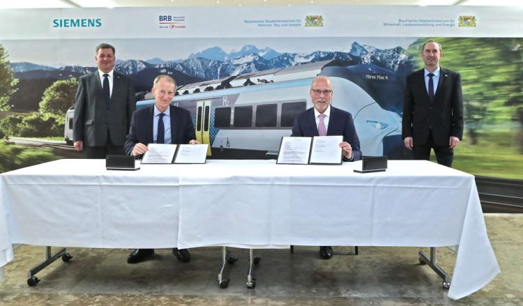First hydrogen-powered train for Bavaria. The first hydrogen-powered train for Bavaria is taking form. On March 15, representatives of Siemens Mobility and Bayerische Regiobahn (BRB) signed a leasing contract for the innovative prototype in the presence of Bavaria’s Economic Affairs Minister Hubert Aiwanger and Bavaria’s Transport Minister Christian Bernreiter. The contract is a follow-up to the letter of intent signed by all the participants in July 2021. fltr: Christian Bernreiter (Transport Minister Bavaria), Albrecht Neumann (CEO Rolling Stock, Siemens Mobility), Arnulf Schuchmann (Managing Director, Bayer