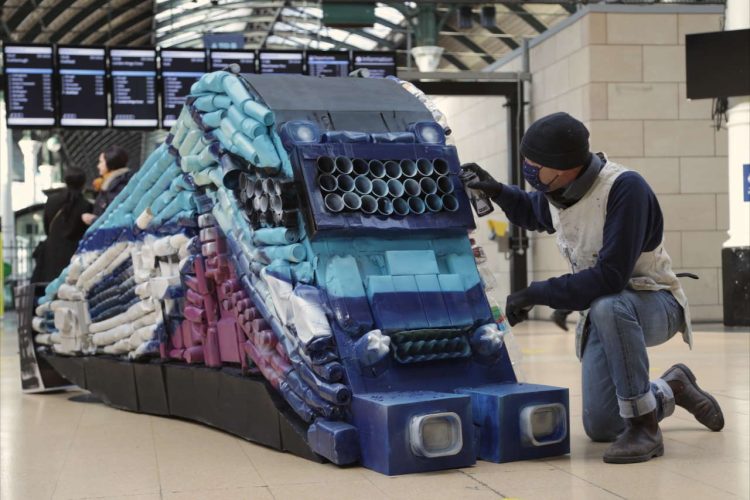 Hull based artist Andy Pea puts the finishing touches to a sculpture made entirely of recycled materials at Hull Paragon Station ahead of Global Recycling Day (002)