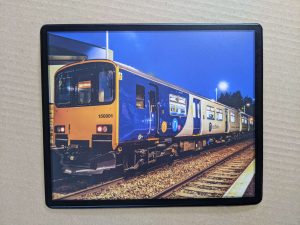 Train Mouse Mat – 150001 stands at Burnley Manchester Road