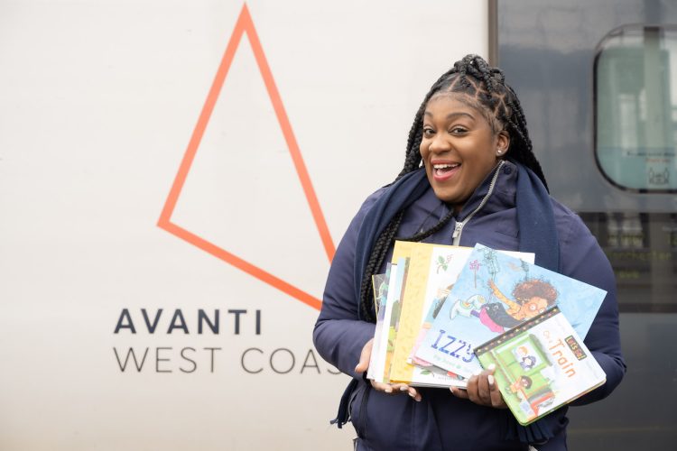 Avanti West Coast On Board Customer Service Assistance Bianca Dennis with some of the books donated to schools.