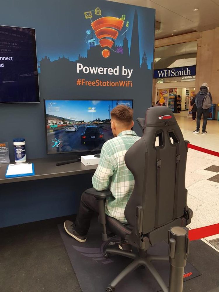Forza being played at Waterloo Station