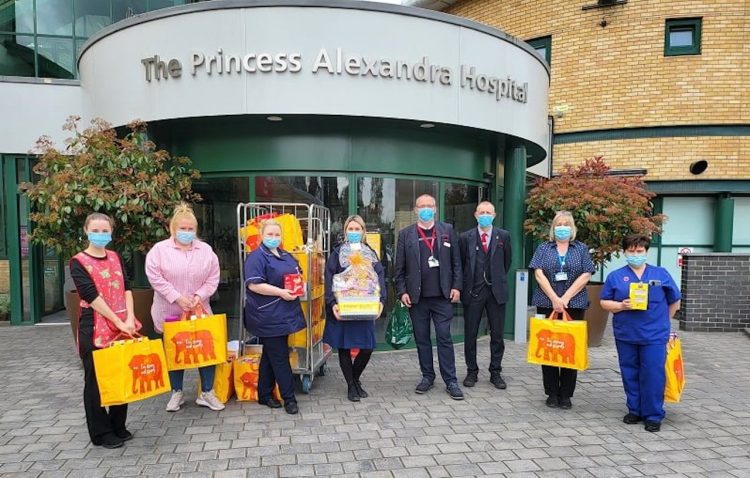 Michael King and Simon Pope donate the treats to Princess Alexandra Hospital