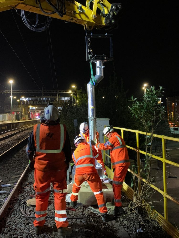 Engineers installing new railway signal posts Macclesfield May 2022