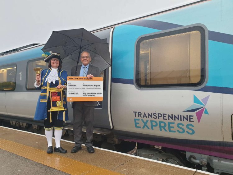 Sharon Wilson, Saltburn Town Crier & Councillor Cliff Foggo, Cabinet Member for Highways and Transport for Redcar & Cleveland Borough Council celebrate new TPE rail link