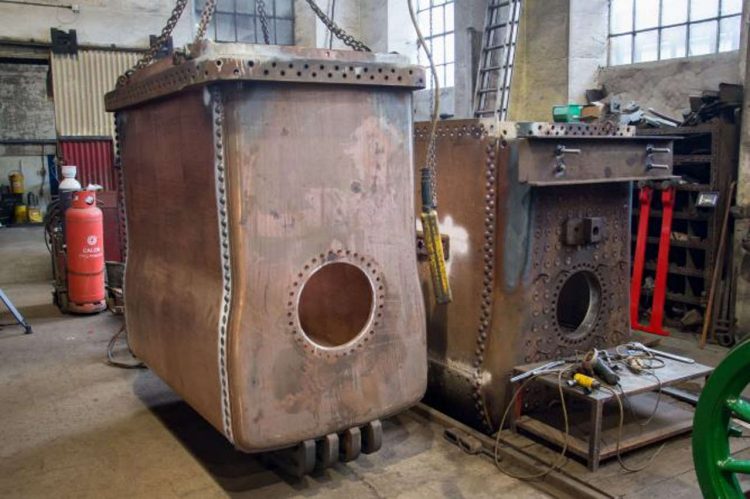 The inner firebox (left) prior to final test fit where it’ll be lowered into the outer firebox (right).
