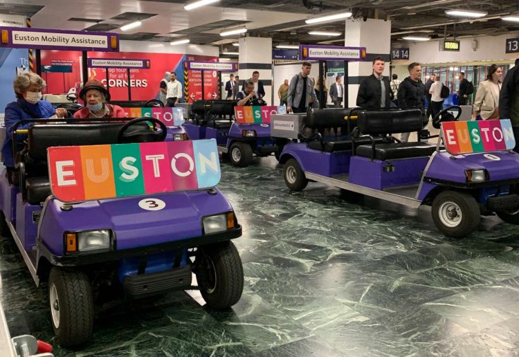 Two old Euston passenger assistance buggies