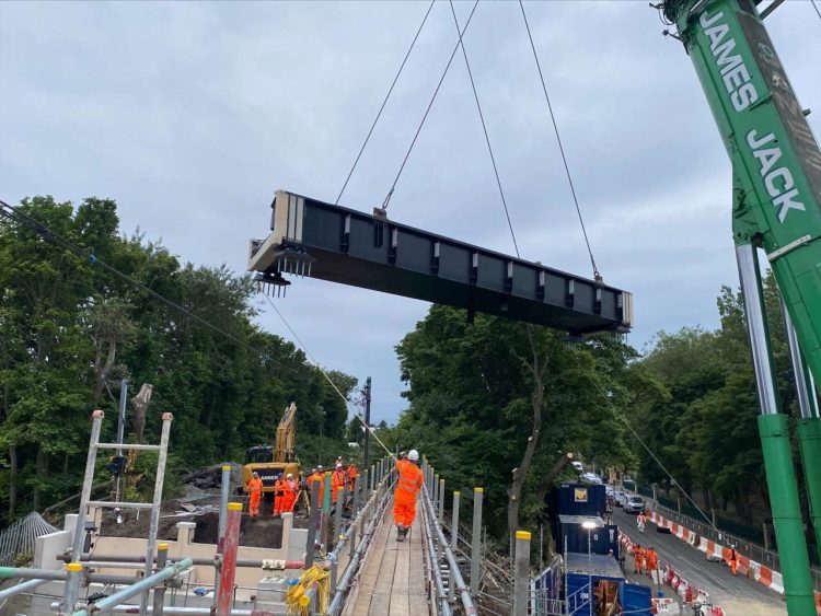 Bridge being lifted into place